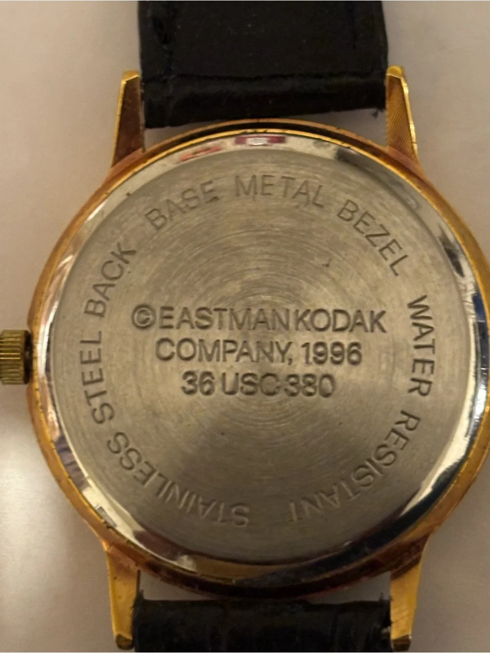 Kodak Gold and Black Kodak Logo Dress Watch